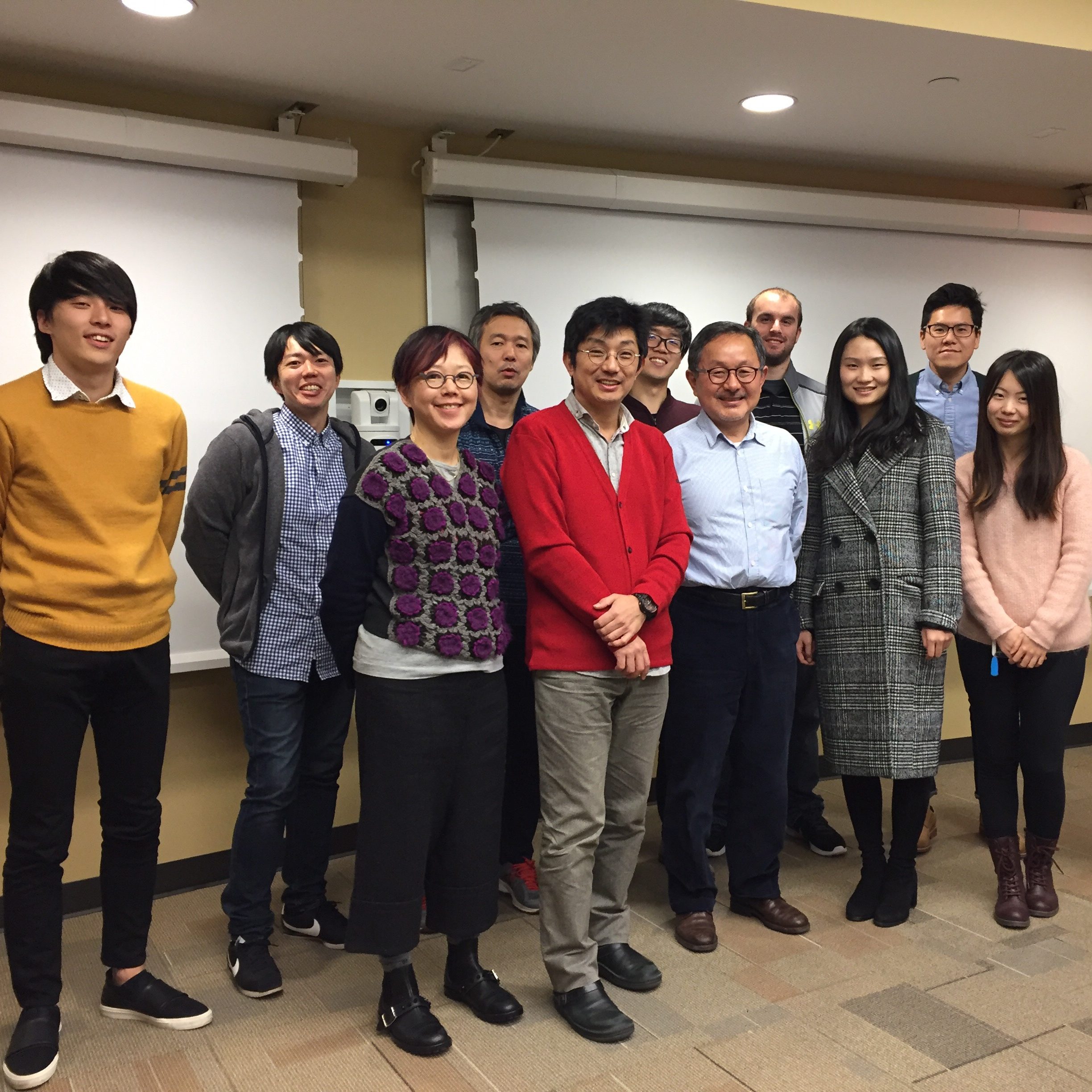 A research meeting with Japanese colleagues including Professors Masami Yamaguchi, So Kanazawa, and Katsumi Watanabe.